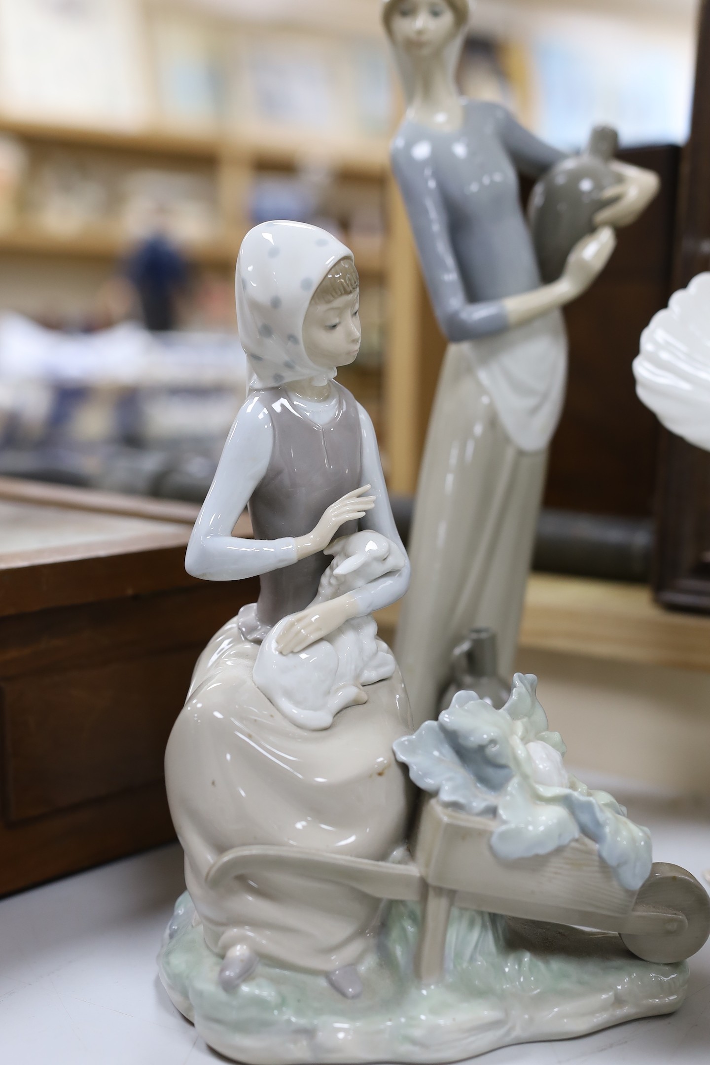 A collection of Lladro figure groups (8) tallest Virgin Mary 34cms high